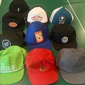 Lot of pre-loved hats in various styles and conditions. Mostly surf brands.
